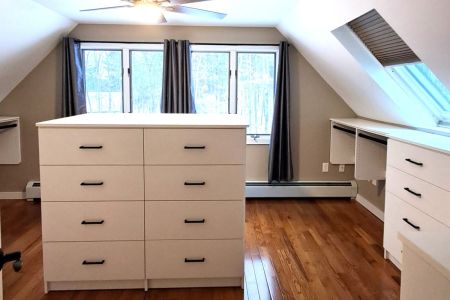 Wakefield NH Angled Ceiling Walk-in Closet.jpg